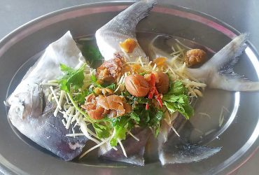 Steamed Pomfret with Sour Plum Ginger and Thai Herbs