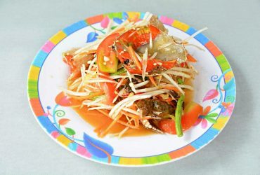 Som Tum papaya salad with pickled sea egg crab